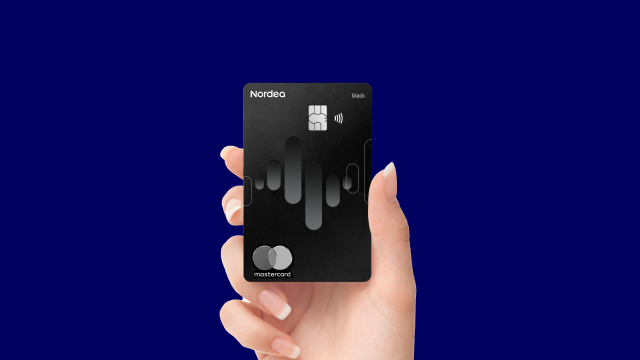 Nordea Black card in female hand - 640x360
