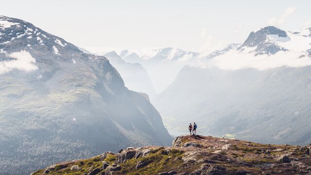 Savings images - tourists admiring mountains - small