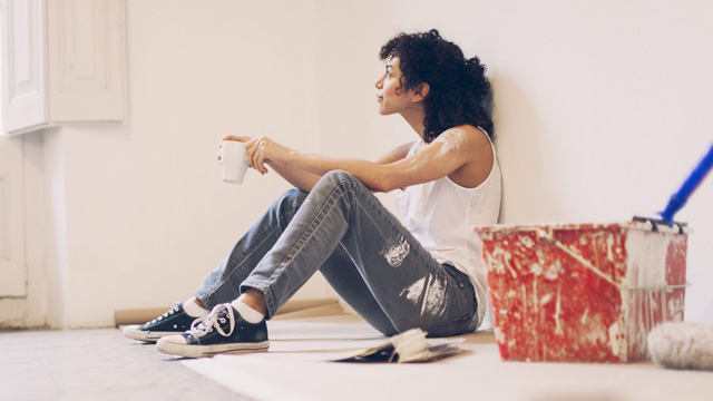 Woman taking a break from painting