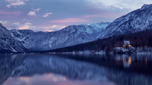 Winter calm lake and cabin 